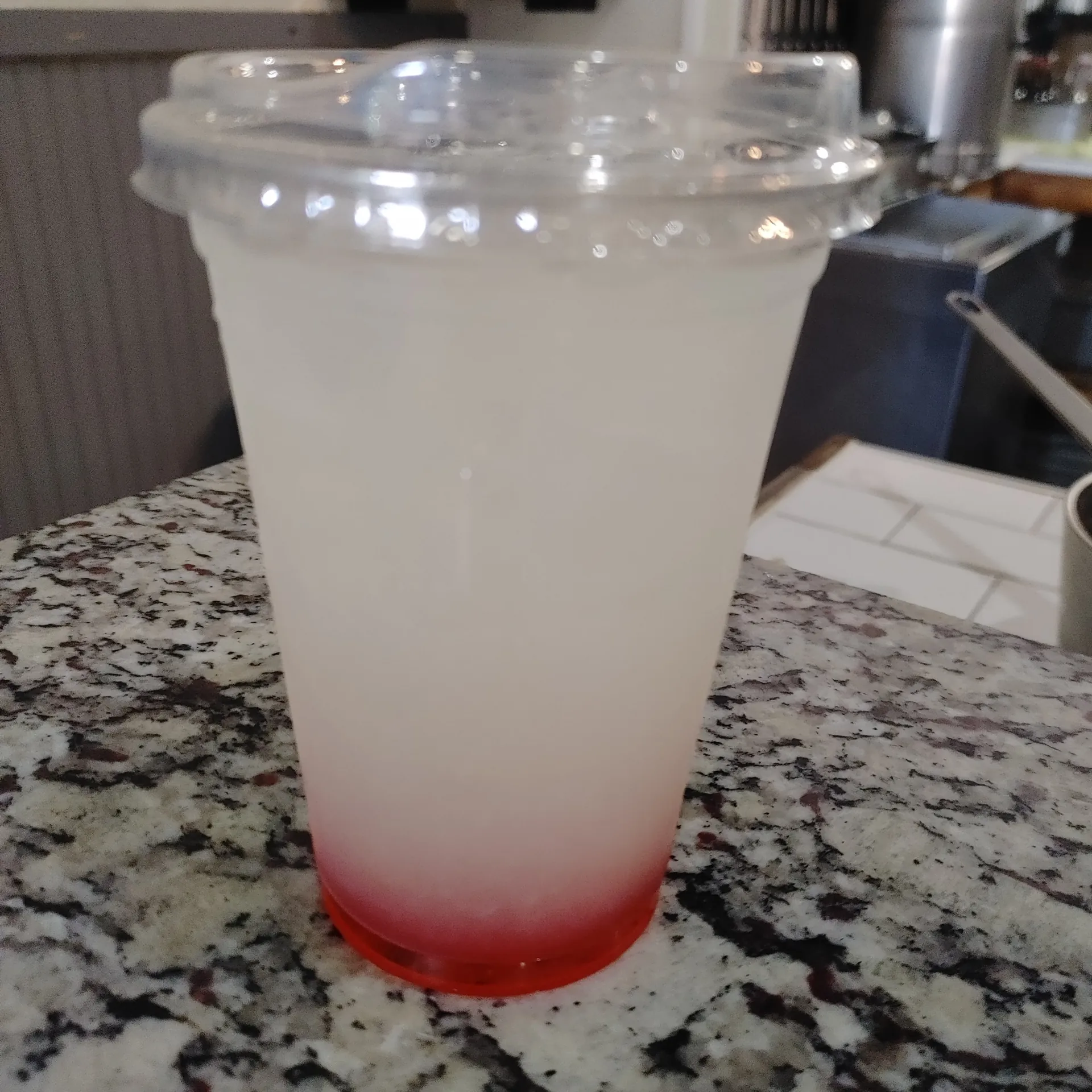 A berry lemonade served over ice